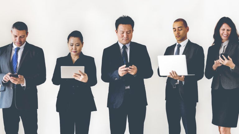 Business people using digital devices