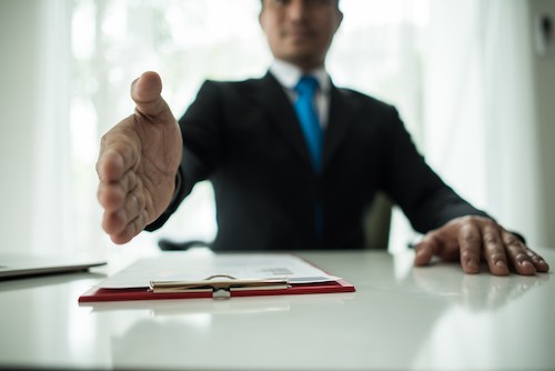 Business man about the shake hands