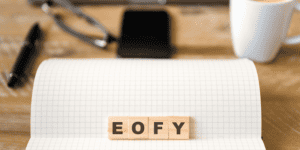 EOFY scrabble keys on office desk