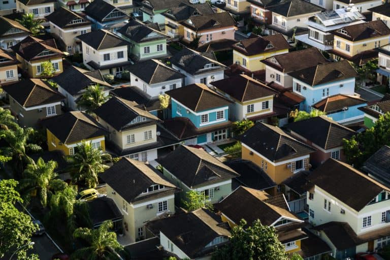 An aerial view of a neighborhood showing houses.